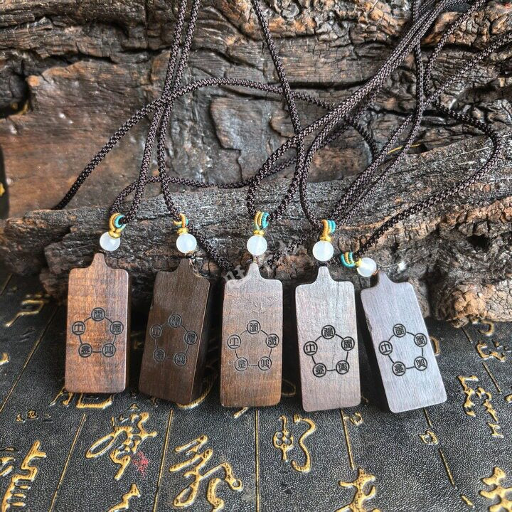 Woman wearing North Star thunderstruck wood sigil pendant close to heart